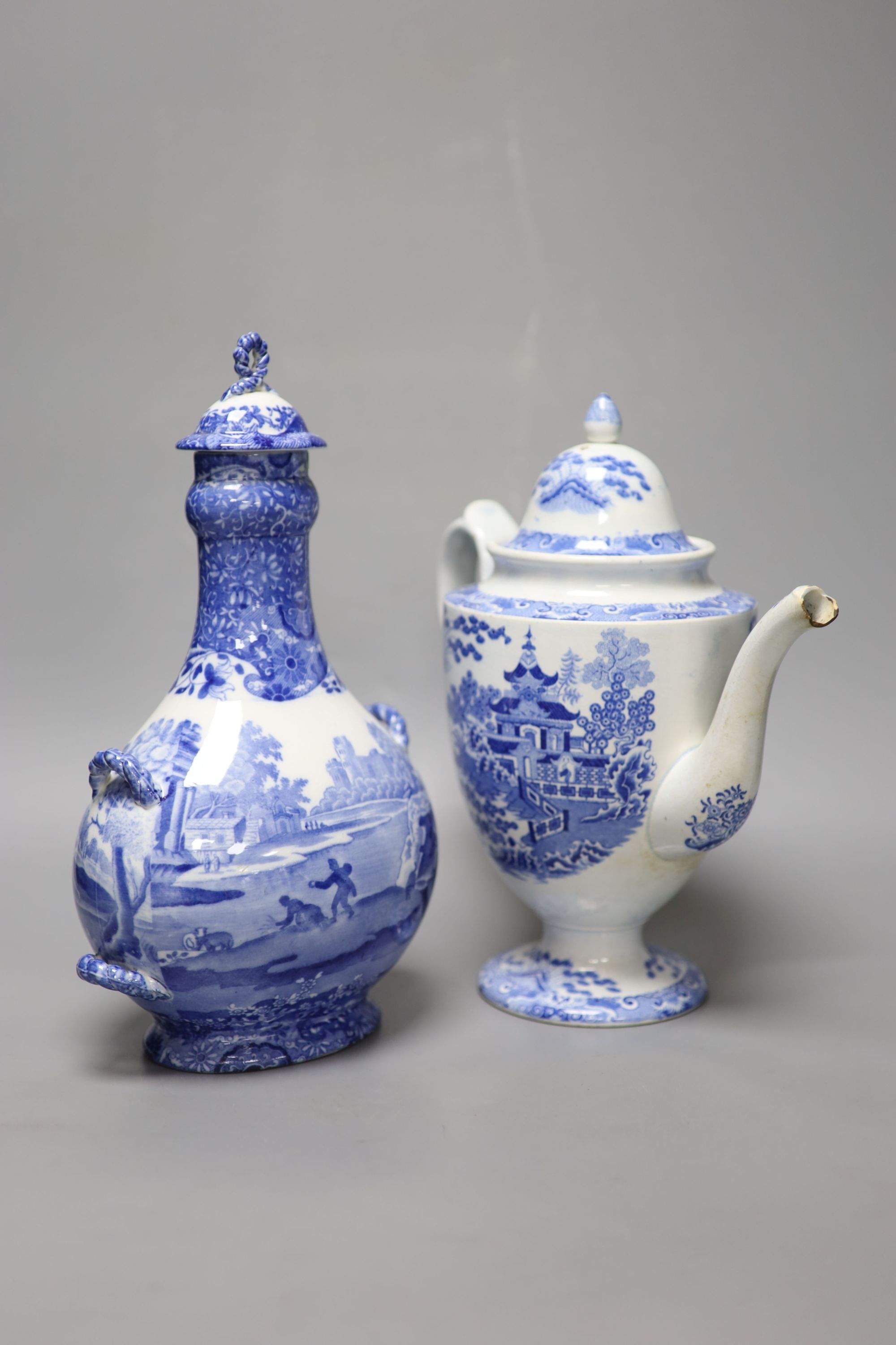 A Staffordshire pearlware blue and white pottery coffee pot and a Copeland Spode pilgrim flask, tallest 31cm